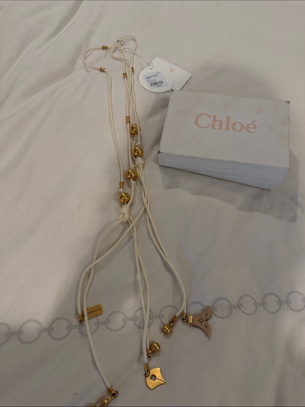 Chloé Ivory Cord Necklace with Gold Beads and Charms
